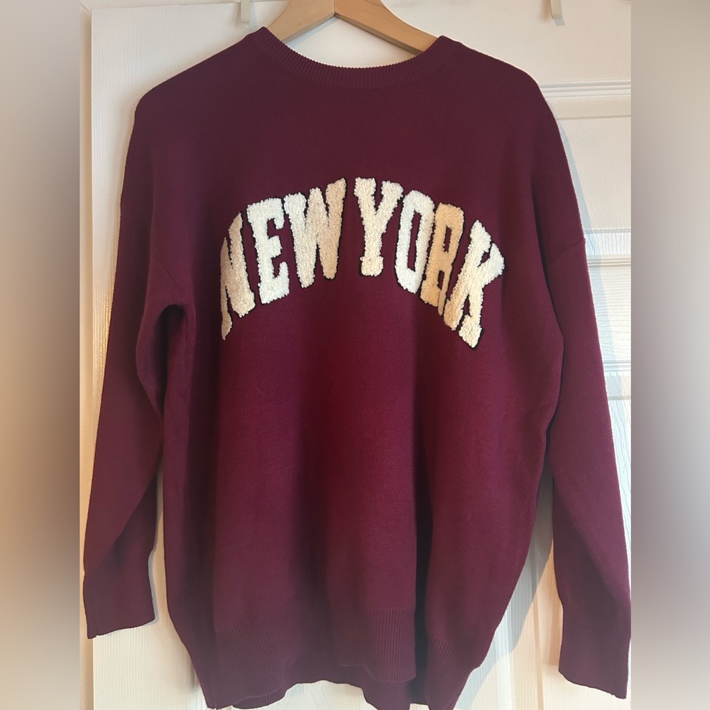 New with tags sweater with lettering